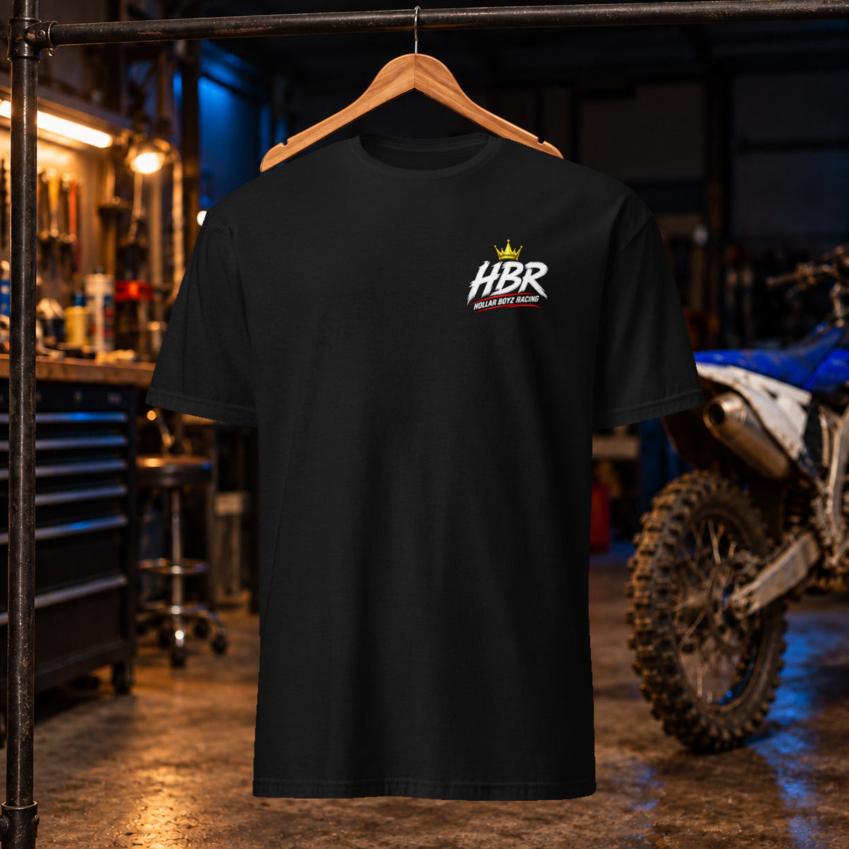 HBR Gildan 64000 tee — black front, approved crown left-chest logo; garage product mockup
